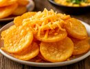 Луковые чипсы с сыром: как приготовить хрустящий перекус всего за полчаса